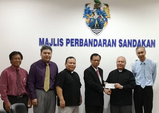 Sandakan Municipal President Gets A Visit From The Church Catholic Archdiocese Of Kota Kinabalu